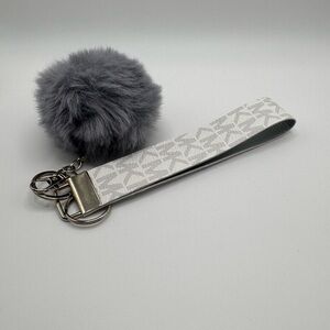 Pattern Wristlet Keychain with Gray Pom Pom